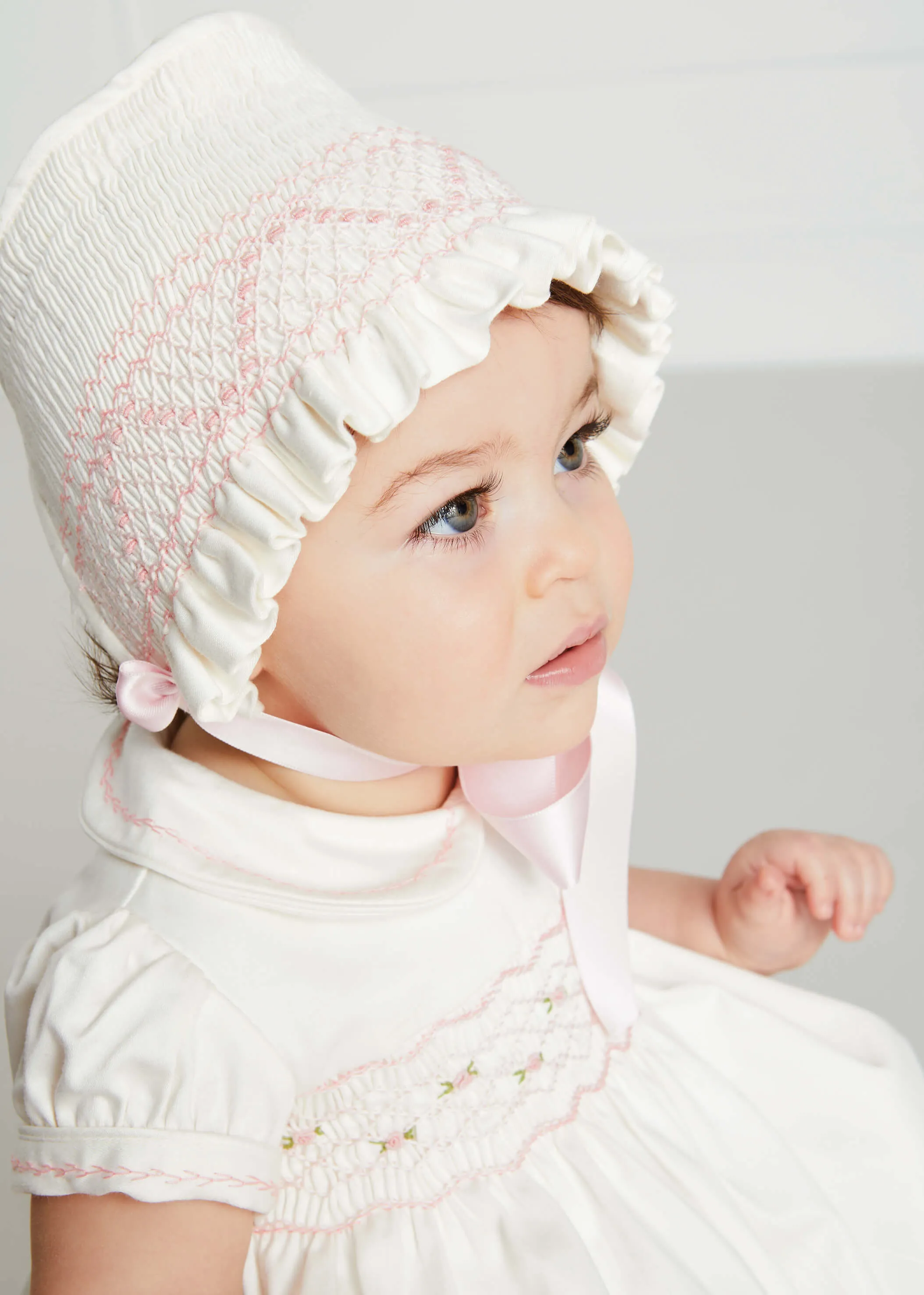 Classic Off-White Pink Handsmocked Romper (3-18mths)