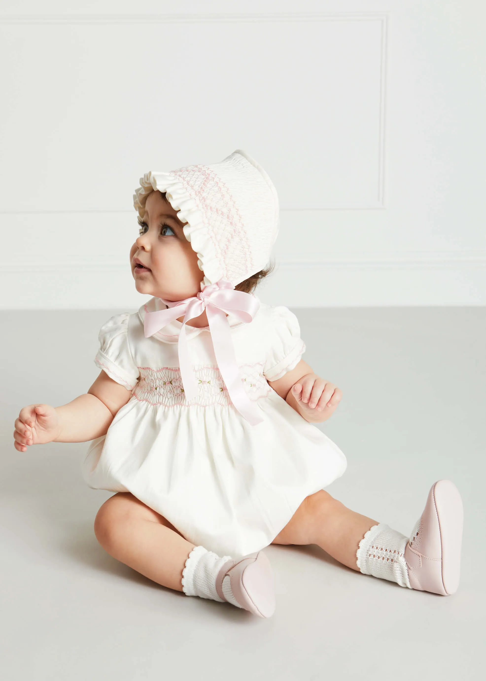 Classic Off-White Pink Handsmocked Romper (3-18mths)